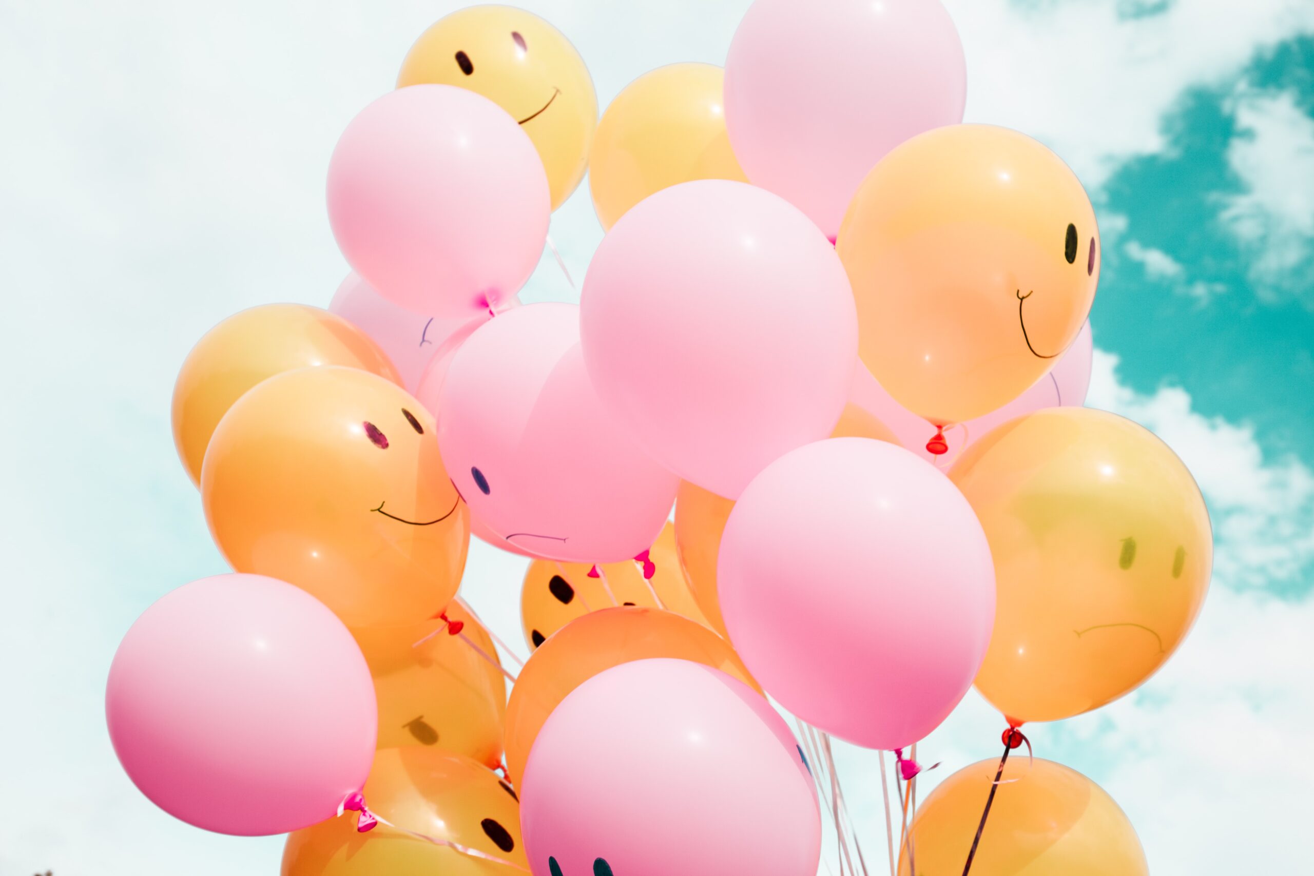 smiley faces on balloons